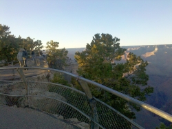 Tourists looking out over the canyon at Mather Point